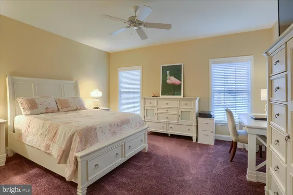 a bedroom with a bed and furniture