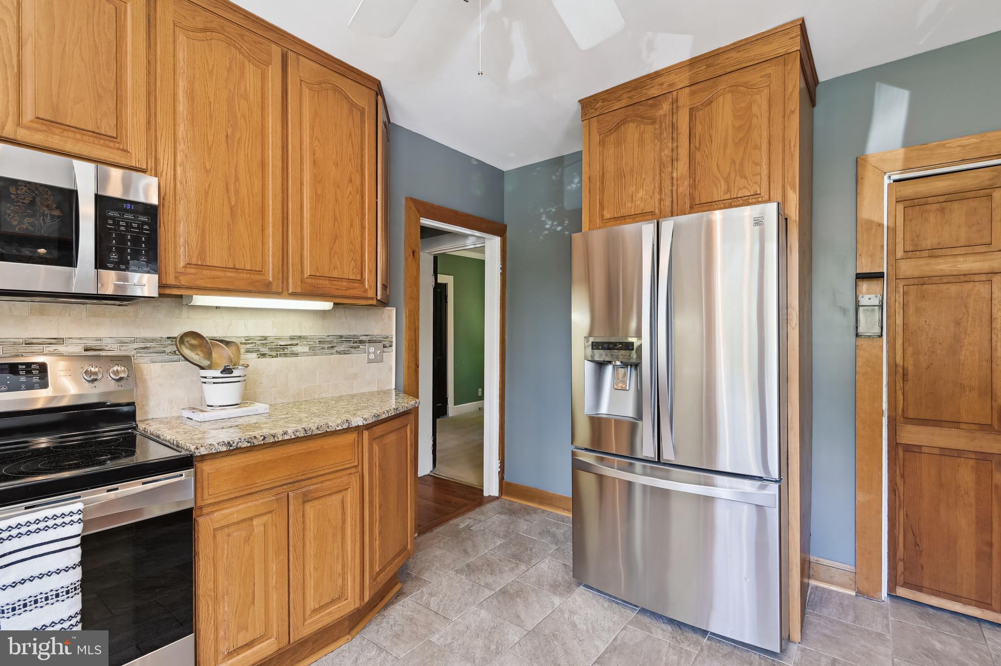 65 Church Road Arnold, MD 21012 - Photo 9 of 58 Stainless appliances and granite counters