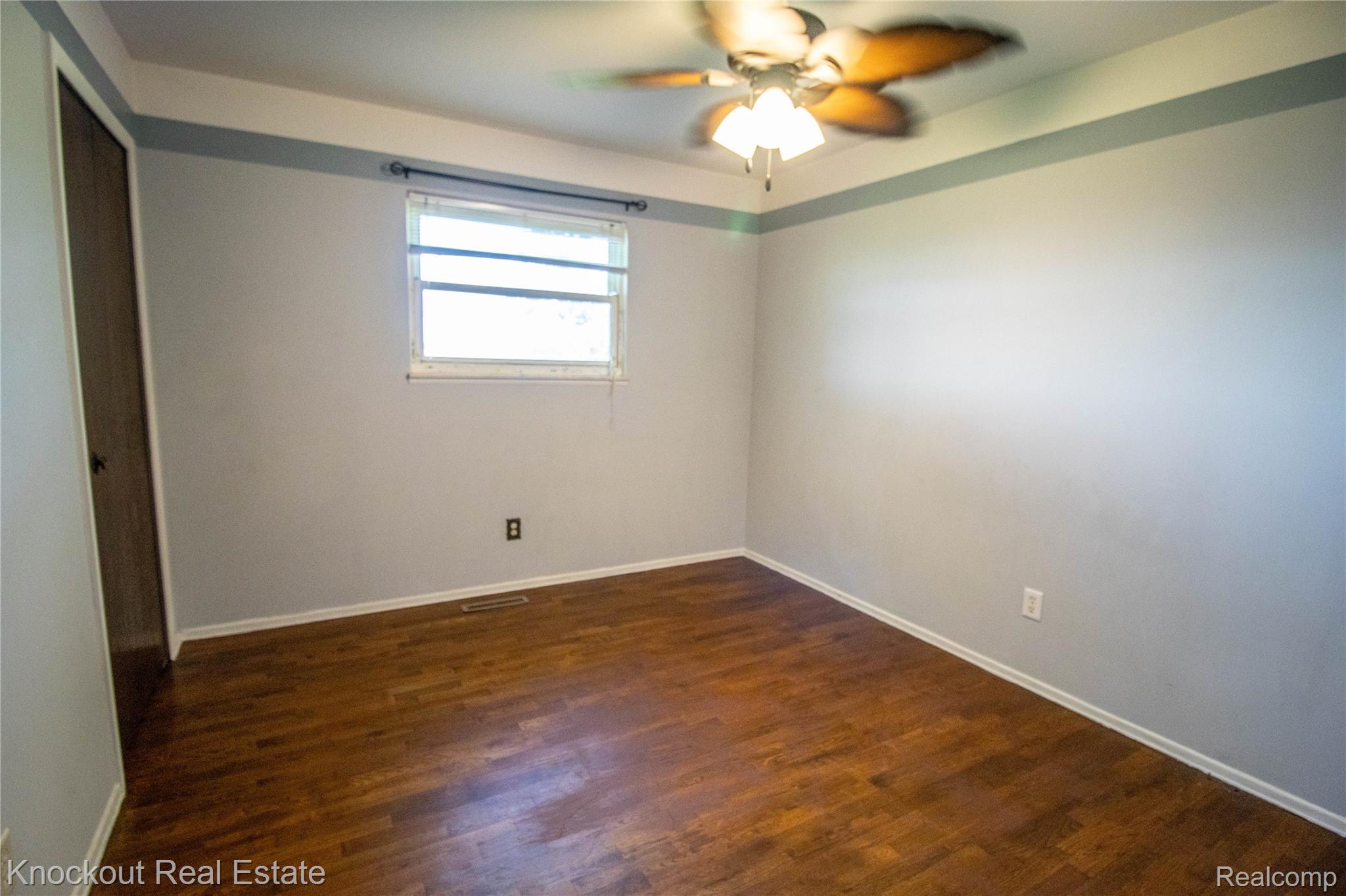 5796 East Burt Road Birch Run, MI 48415 - Photo 20 of 41 Wood-finish flooring with a light wall color