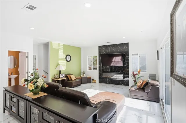 a living room with furniture and a couch