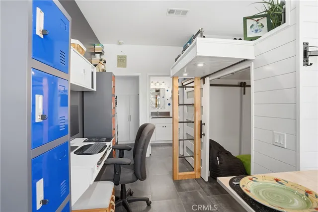 a view of a back yard from a balcony