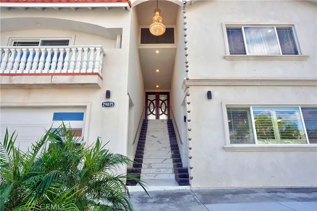a front view of a house with large window
