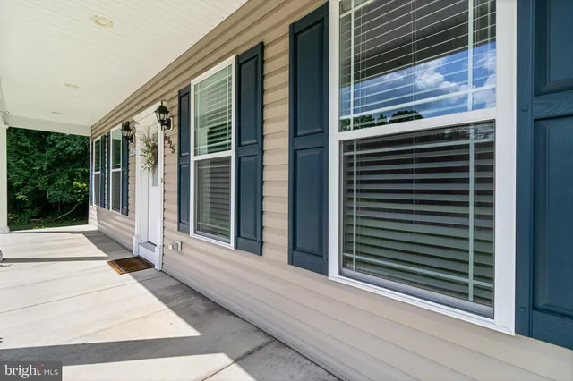 a view of a door and a window