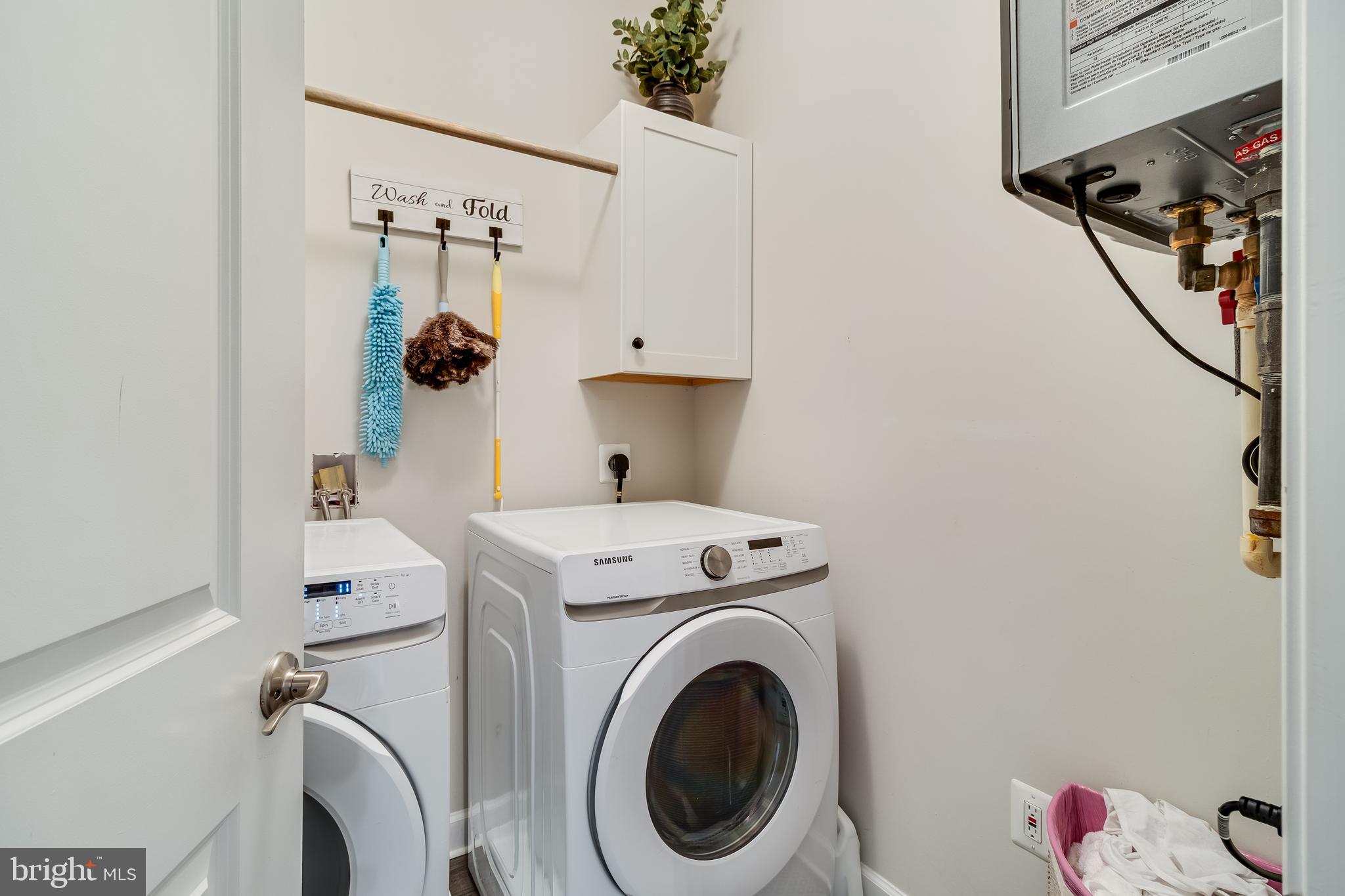 6925 Rock Spring Place Bryans Road, MD 20616 - Photo 17 of 32 a utility room with dryer and washer