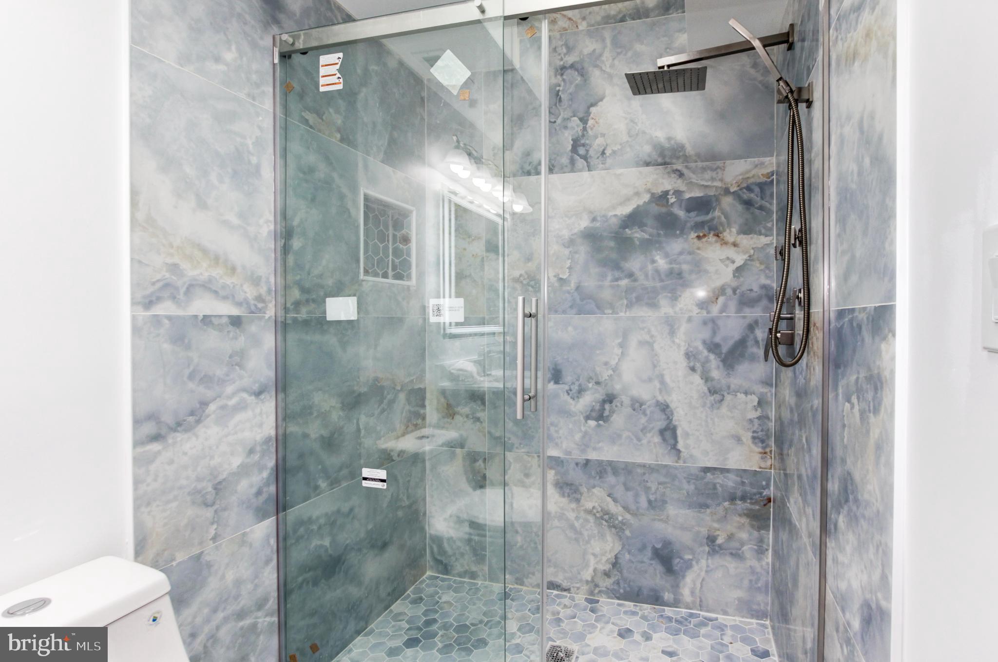 1324 Aisquith Street Baltimore, MD 21202 - Photo 27 of 47 a bathroom with a shower