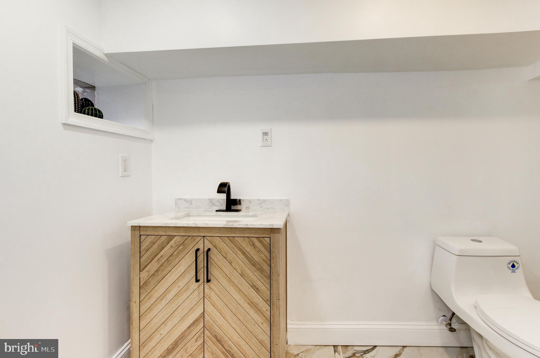 1324 Aisquith Street Baltimore, MD 21202 - Photo 33 of 47 a view of washer and dryer