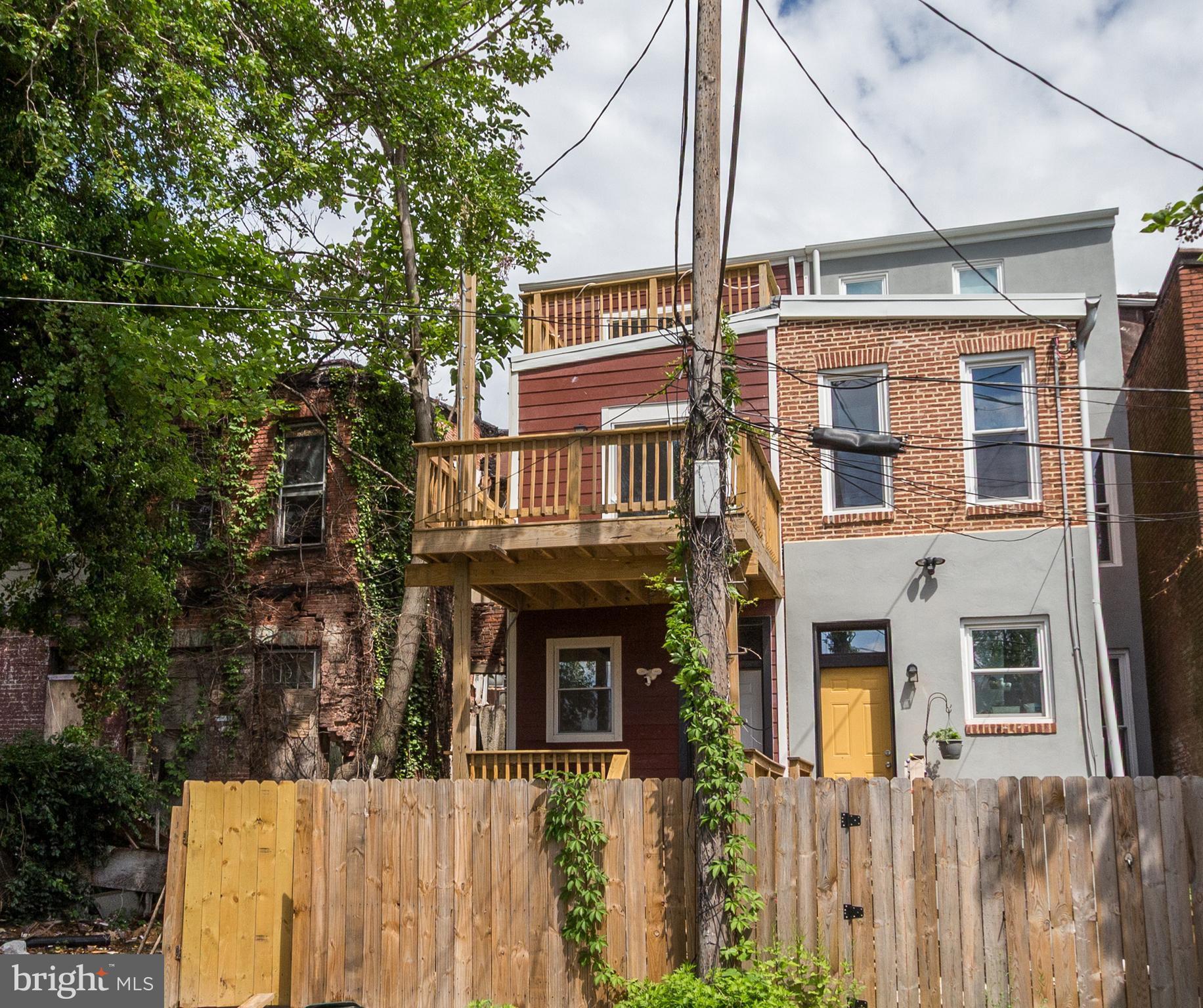 1324 Aisquith Street Baltimore, MD 21202 - Photo 45 of 47 a front view of a multi story residential apartment building