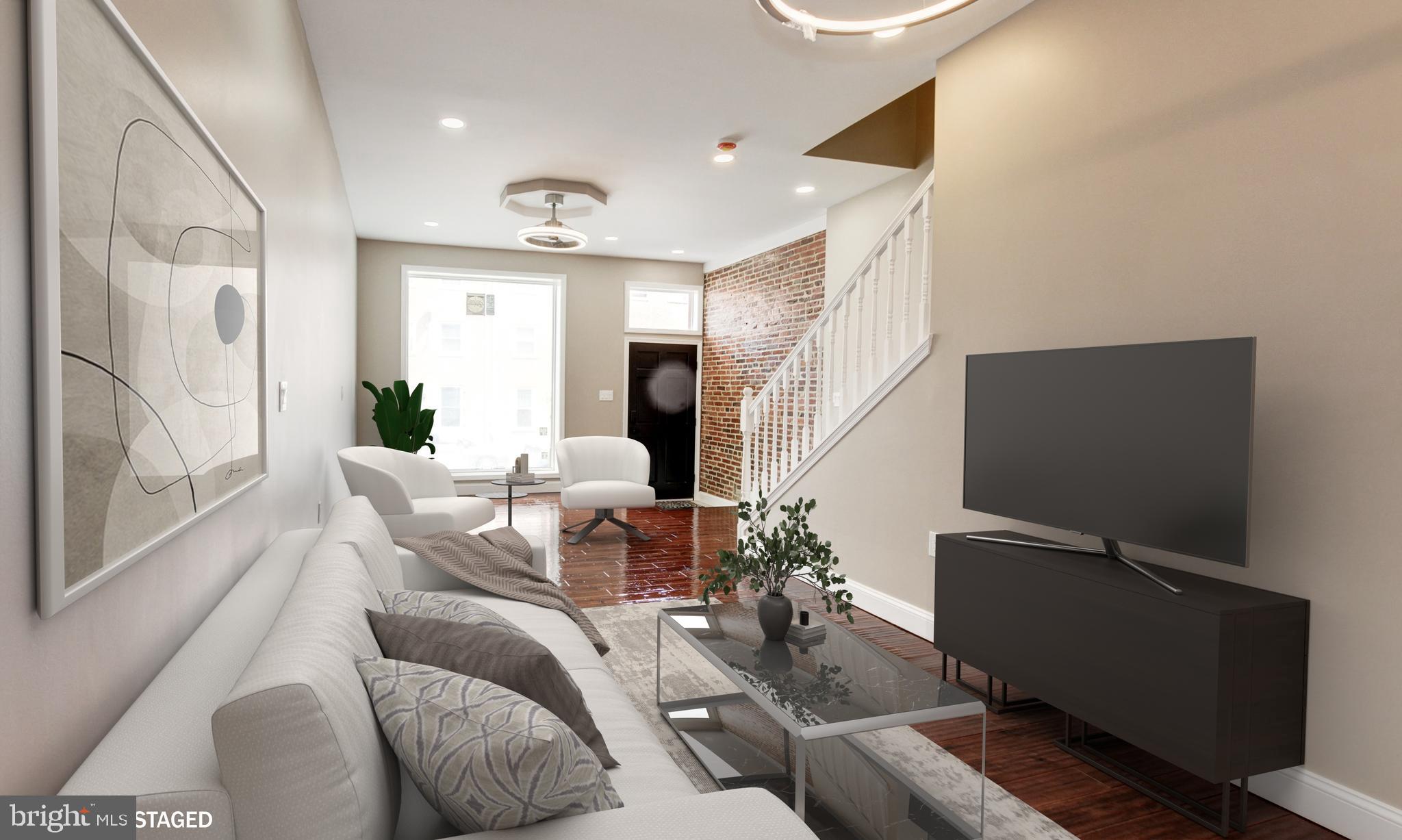 1324 Aisquith Street Baltimore, MD 21202 - Photo 9 of 47 a living room with furniture and a flat screen tv