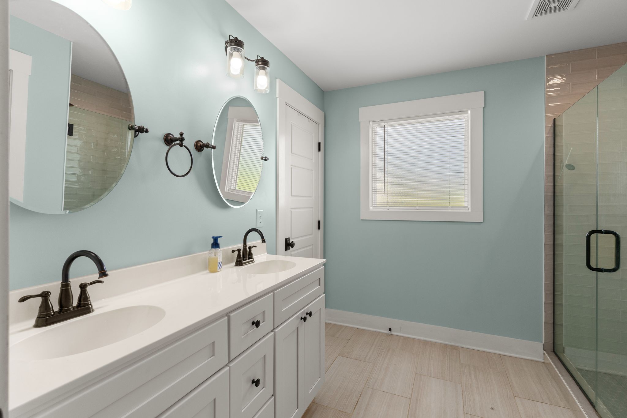 5216 Highway 161 Springfield, TN 37172 - Photo 14 of 31 a bathroom with a double vanity sink and a mirror
