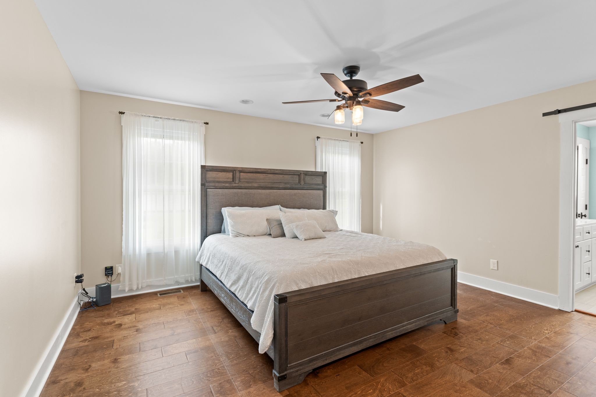 5216 Highway 161 Springfield, TN 37172 - Photo 19 of 31 a bedroom with a bed and a ceiling fan