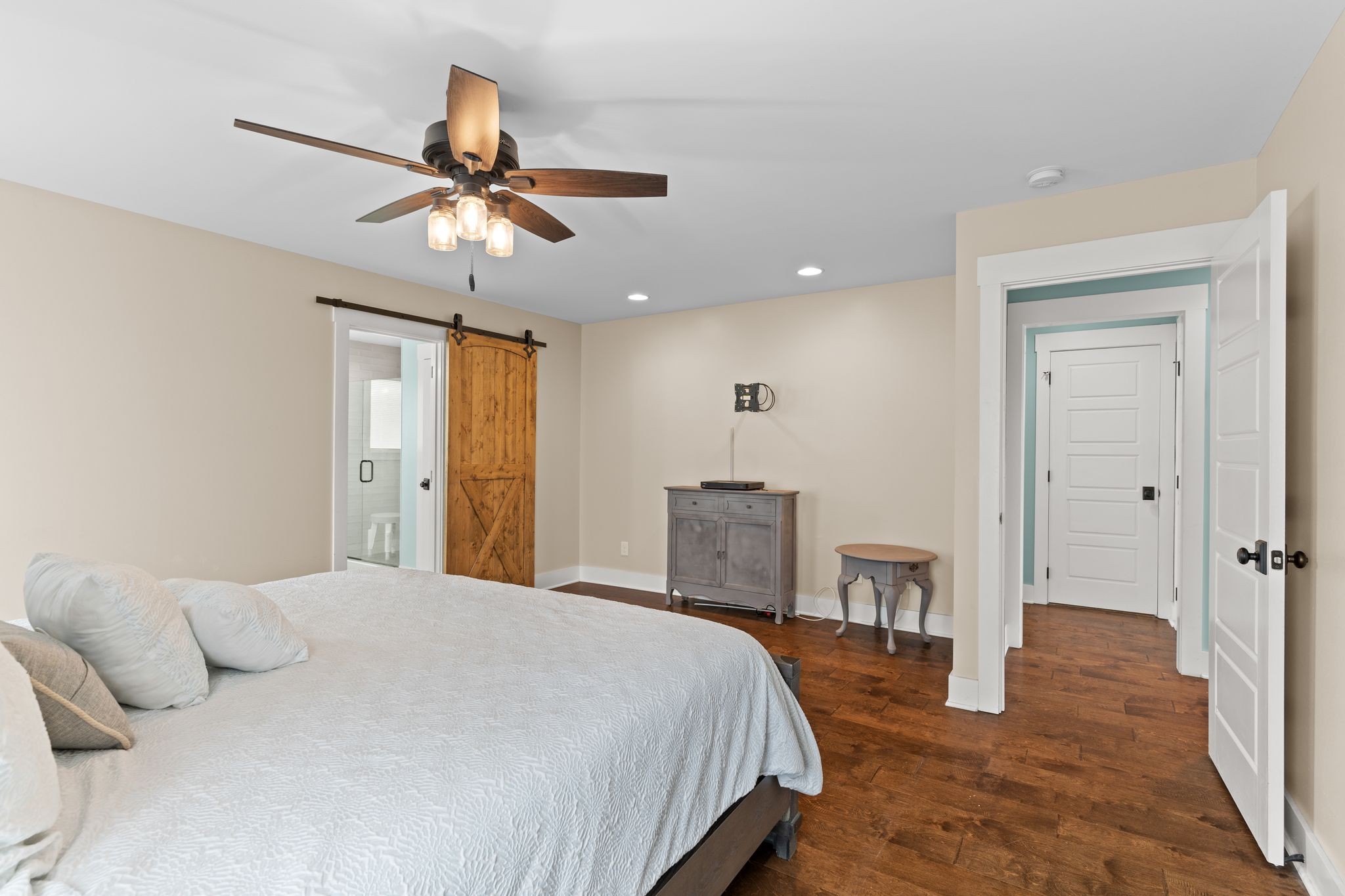 5216 Highway 161 Springfield, TN 37172 - Photo 20 of 31 a bedroom with a bed and a chandelier