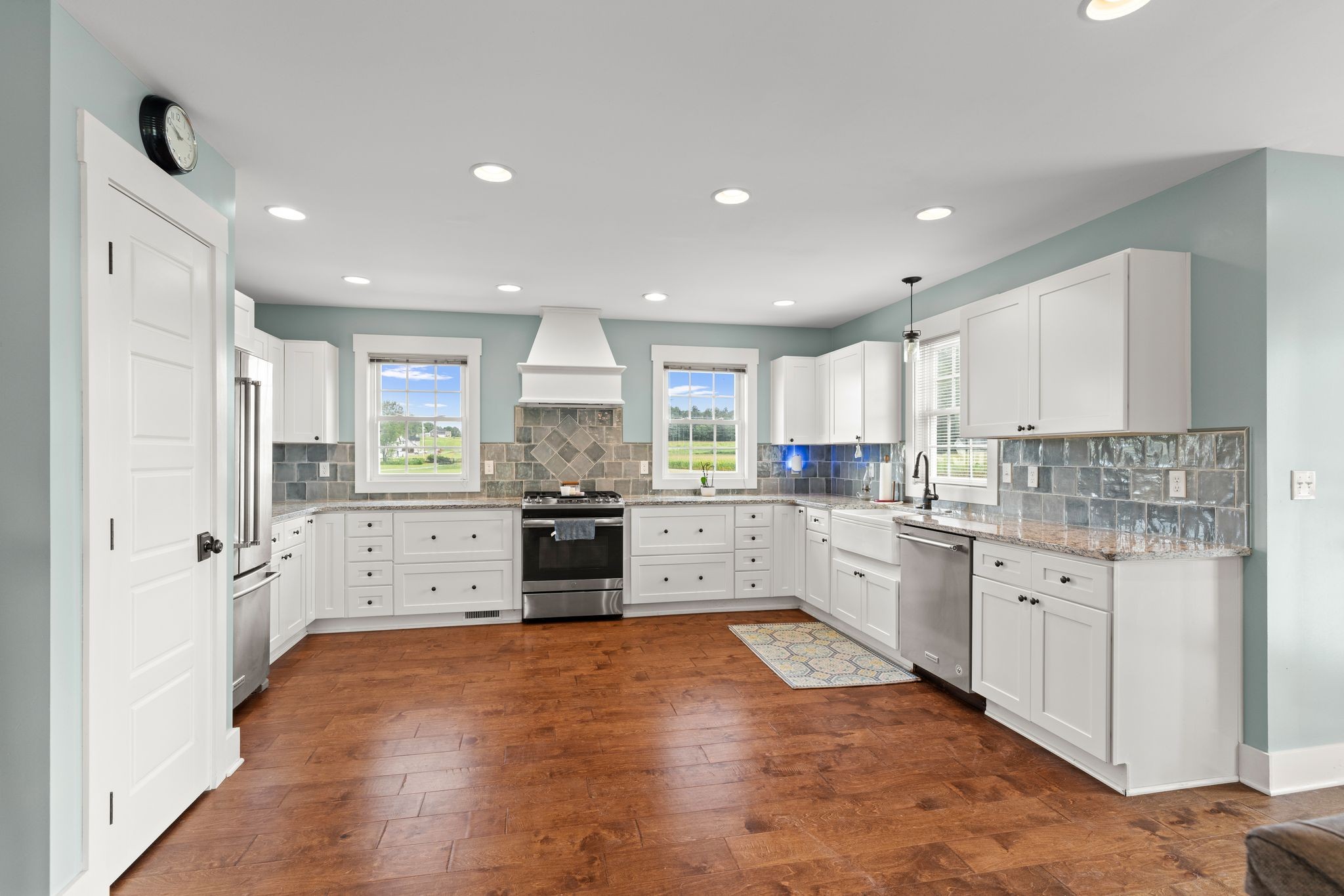 5216 Highway 161 Springfield, TN 37172 - Photo 7 of 31 a kitchen with granite countertop white cabinets and white appliances