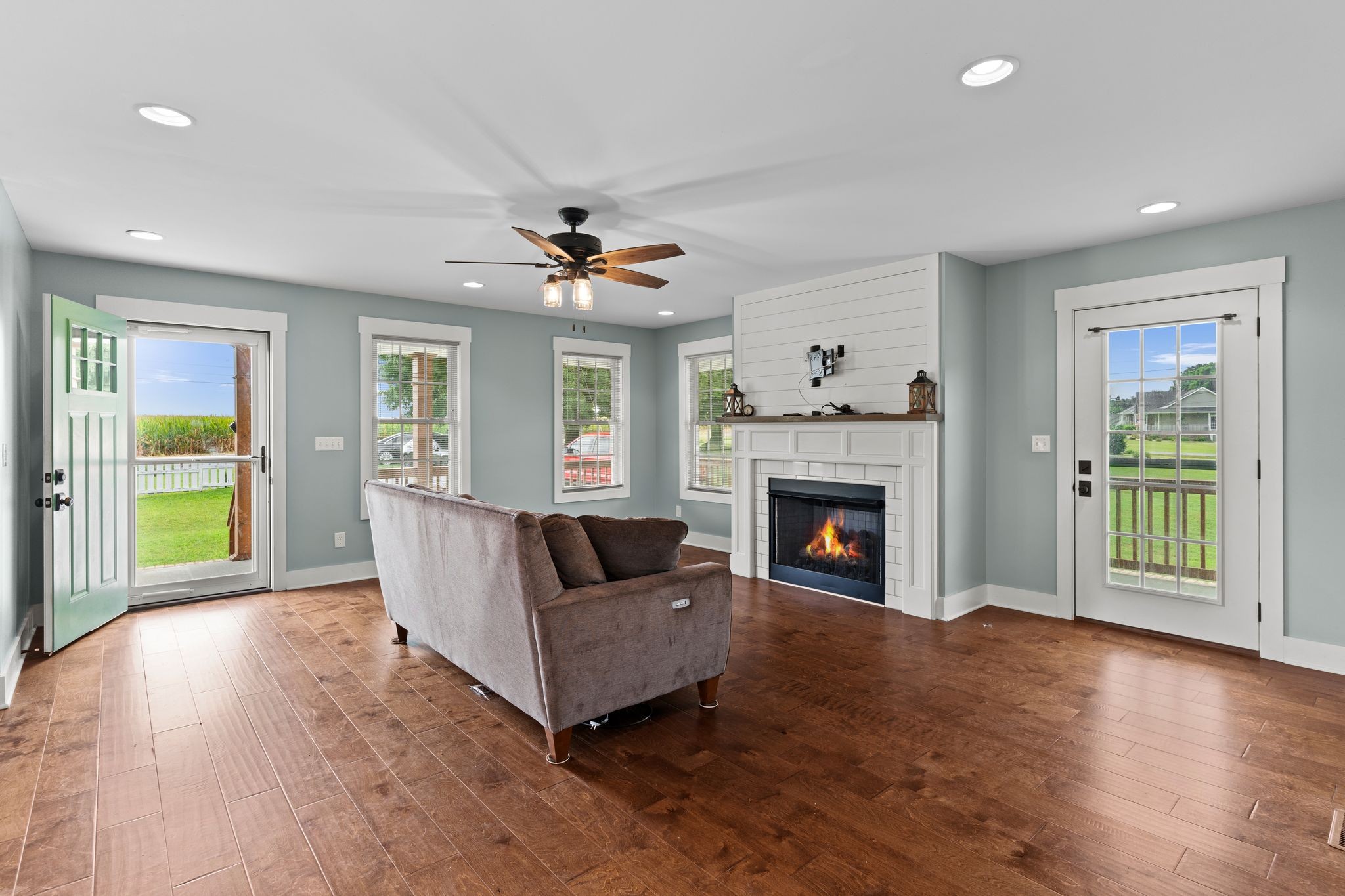 5216 Highway 161 Springfield, TN 37172 - Photo 10 of 31 a living room with furniture and a fireplace