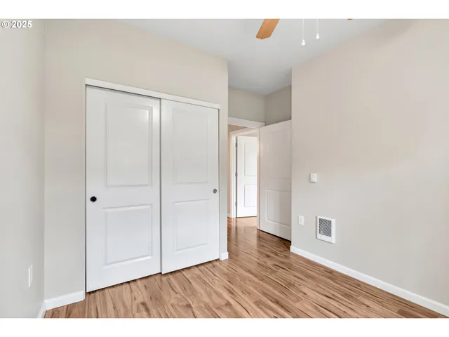 a view of a car parked in front of a house
