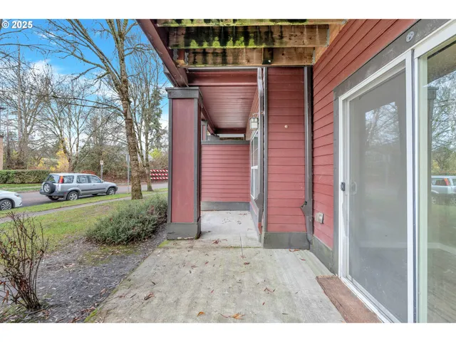 a view of a door and a window