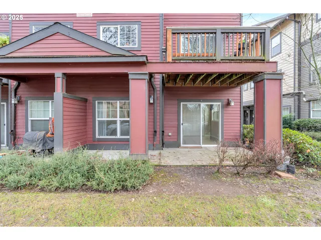 a front view of a building with garden