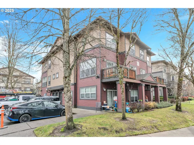 a front view of a building with parking space