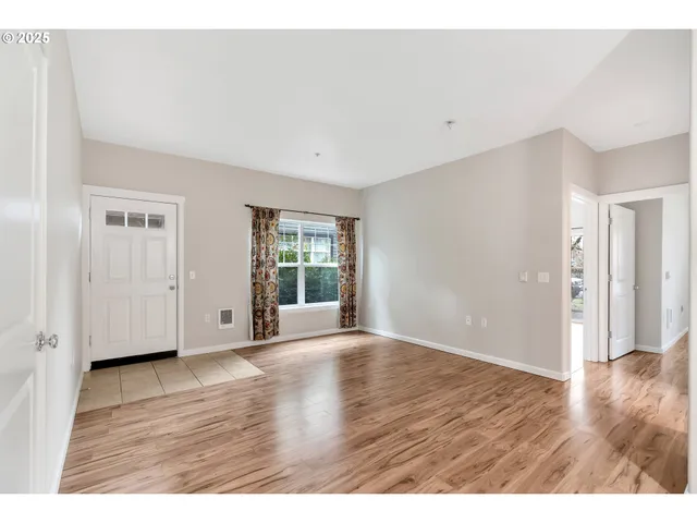 a view of a kitchen with a sink