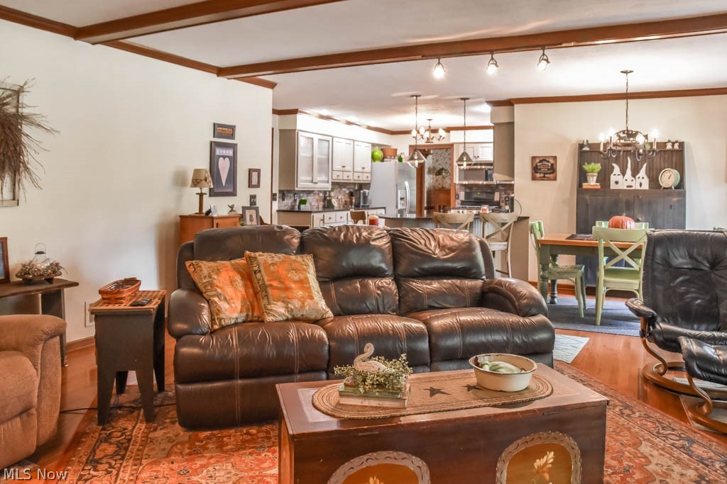 1741 Summerchase Road Northeast North Canton, OH 44721 - Photo 2 of 35 Wood beams in the family room.