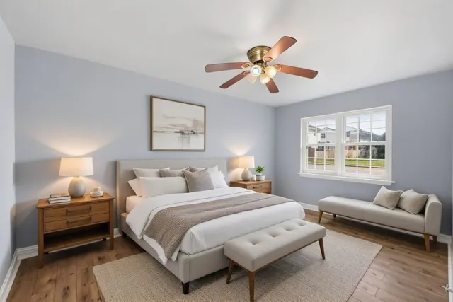 a bedroom with bed and a couch