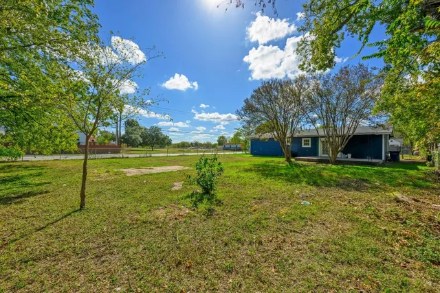 a view of a golf course with a lake