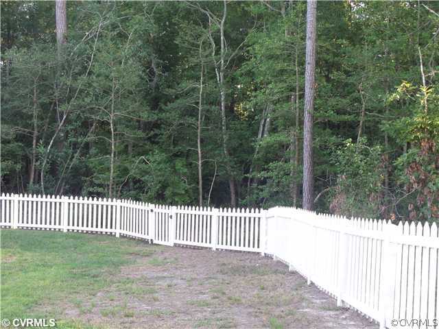 6107 Arbor Ridge Chester, VA 23831 - Photo 23 of 24 a view of a yard with a fence