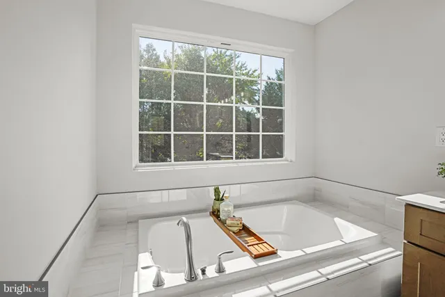 a bathroom with a sink and a bathtub