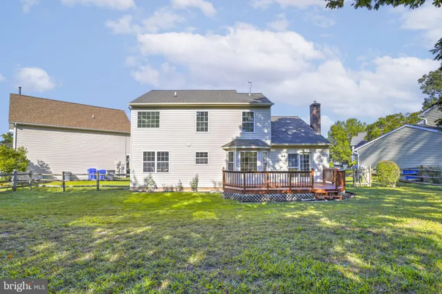 an outdoor space with furniture and garden view