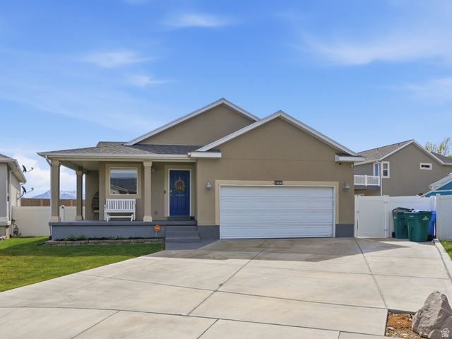 4847 West Cold Springs Circle Riverton, UT 84096 - Photo 1 of 1 Single story home with stucco siding, covered porch, an attached garage, and driveway