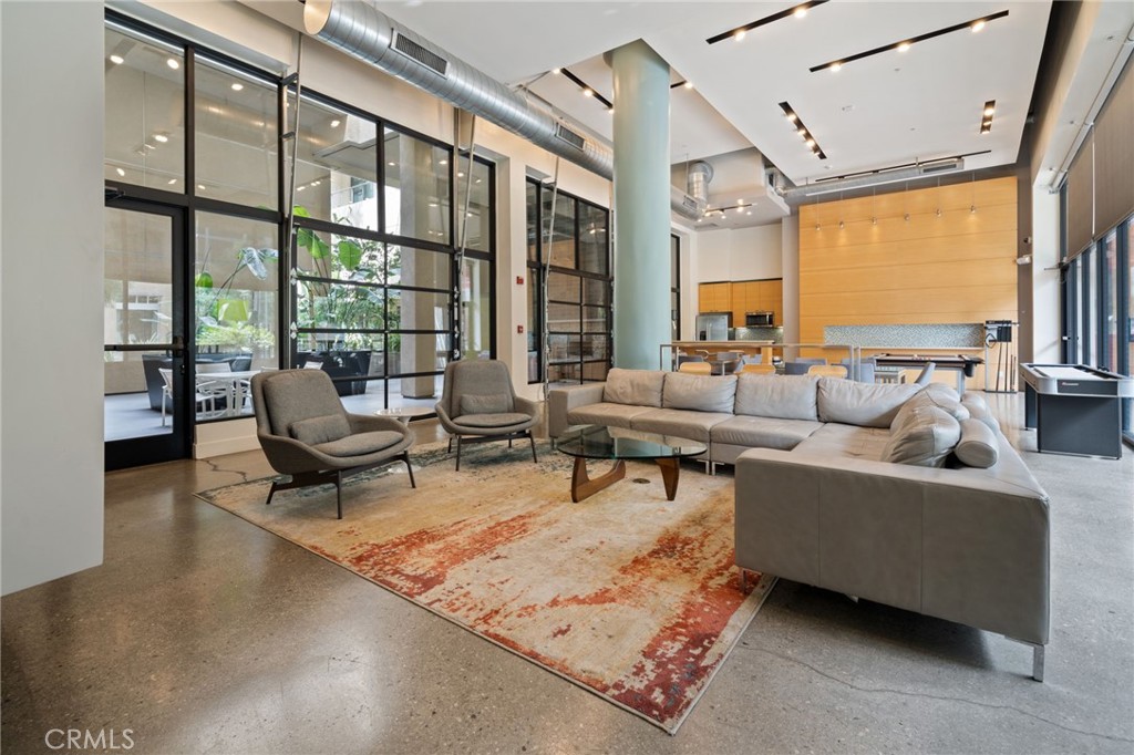 133 The, Unit 404 Long Beach, CA 90802 - Photo 21 of 25 a living room with furniture and a large window