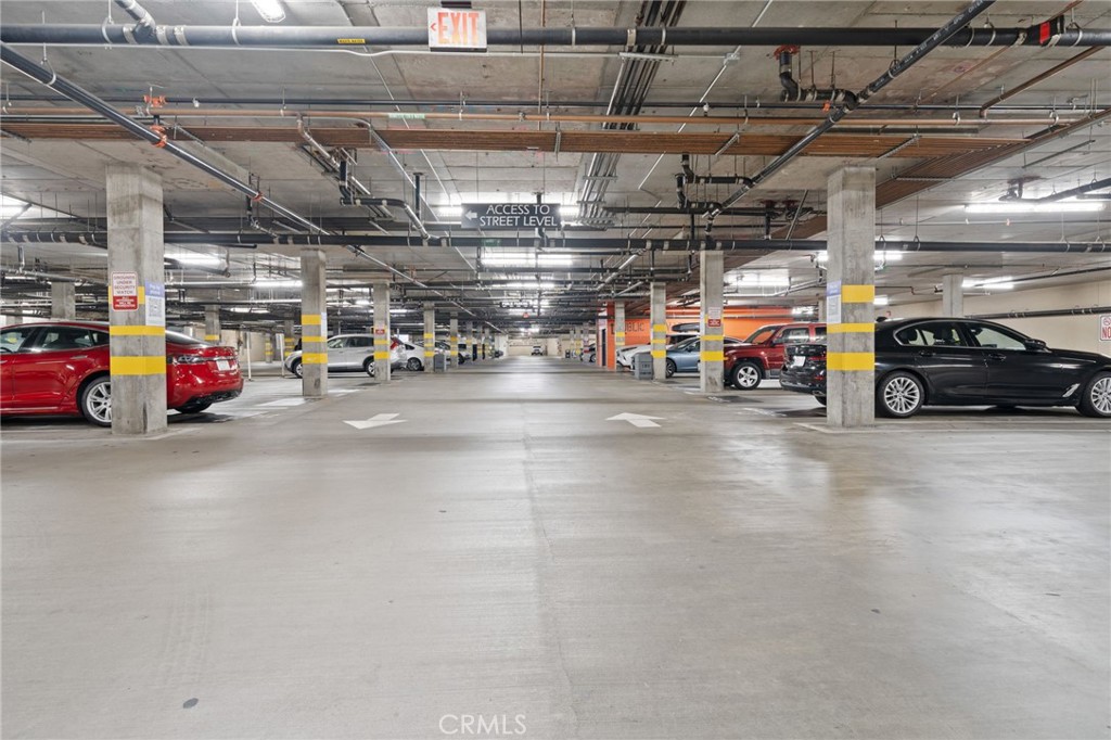 133 The, Unit 404 Long Beach, CA 90802 - Photo 23 of 25 a view of parking garage with cars