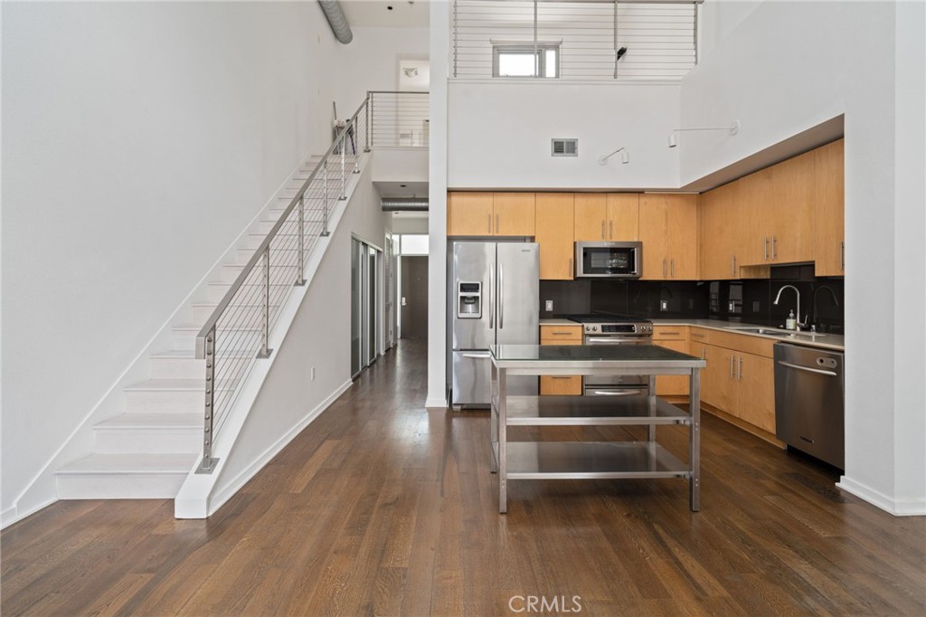 133 The, Unit 404 Long Beach, CA 90802 - Photo 9 of 25 a view of kitchen with microwave and stove top oven