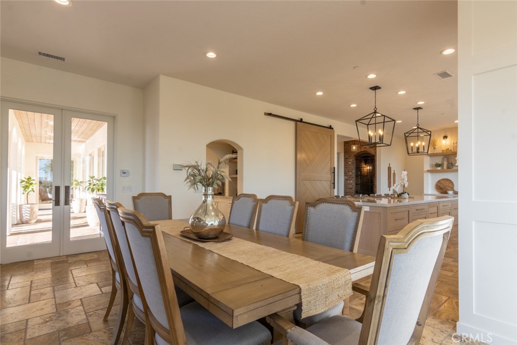 4567 Sleeping Indian Road Fallbrook, CA 92028 - Photo 11 of 72 a view of a dining room with furniture