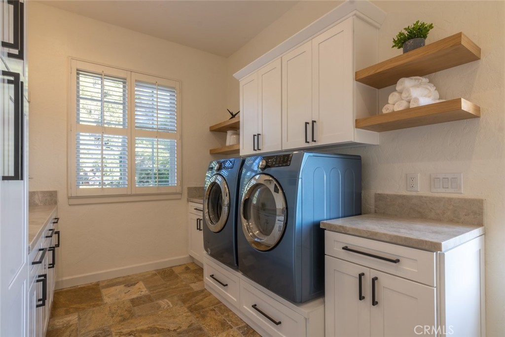 4567 Sleeping Indian Road Fallbrook, CA 92028 - Photo 19 of 72 a utility room with sink dryer and washer