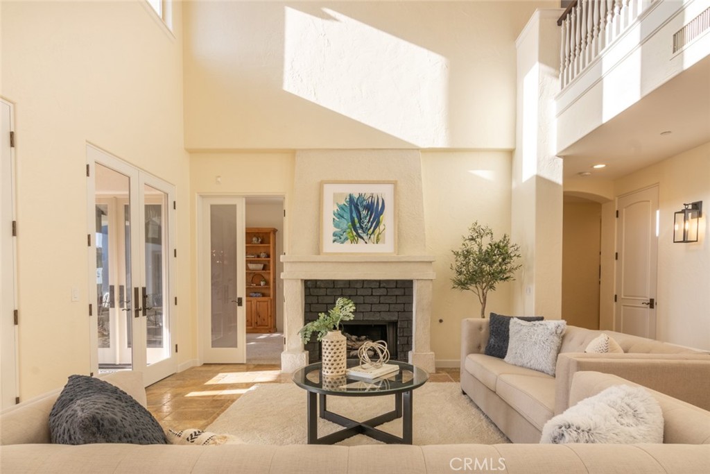 4567 Sleeping Indian Road Fallbrook, CA 92028 - Photo 24 of 72 a living room with furniture and a fireplace