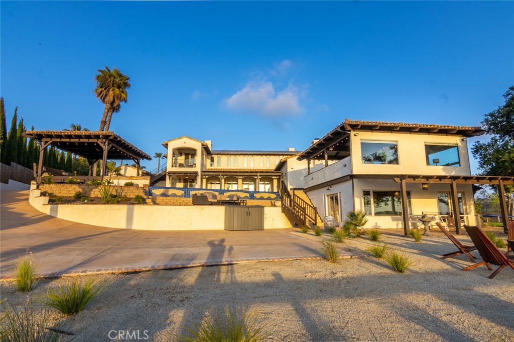 4567 Sleeping Indian Road Fallbrook, CA 92028 - Photo 29 of 72 a view of a house with basketball court