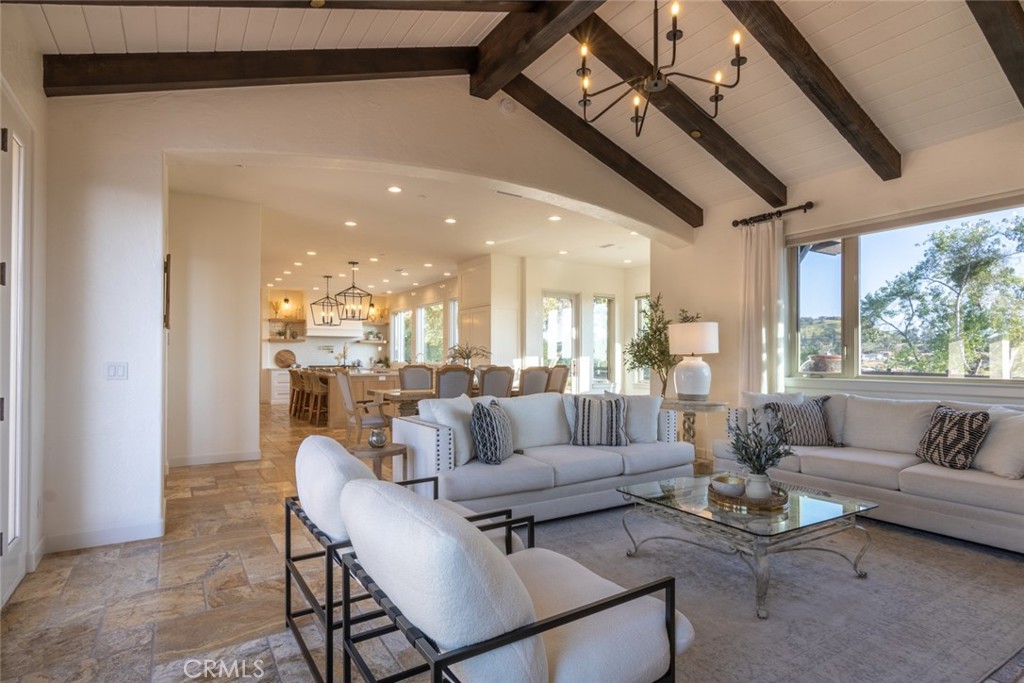 4567 Sleeping Indian Road Fallbrook, CA 92028 - Photo 47 of 72 a living room with furniture and a large window