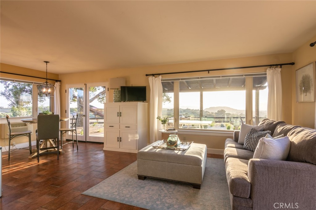 4567 Sleeping Indian Road Fallbrook, CA 92028 - Photo 66 of 72 a living room with furniture and a large window