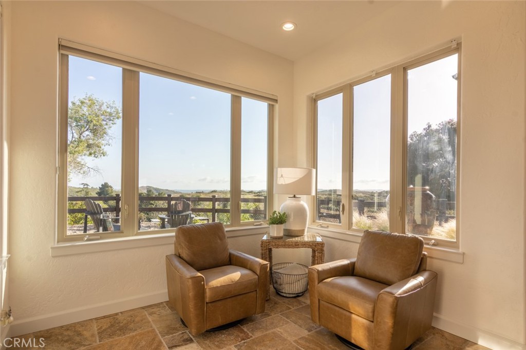 4567 Sleeping Indian Road Fallbrook, CA 92028 - Photo 72 of 72 a living room with furniture and floor to ceiling windows