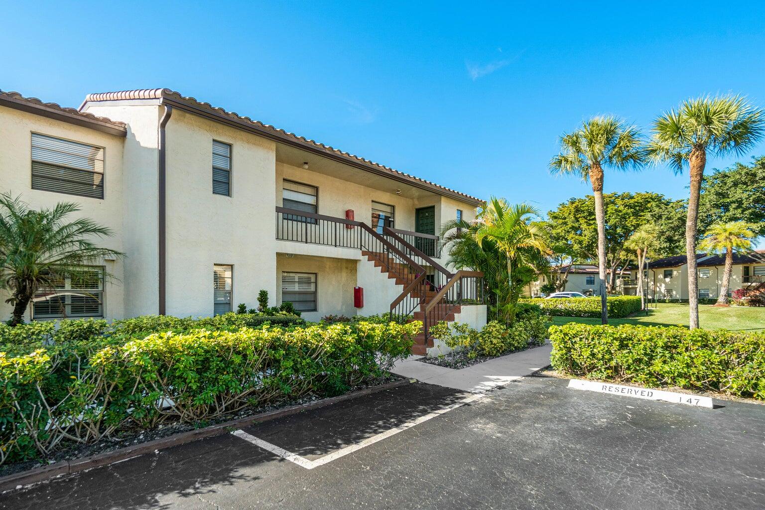 21863 Arriba Real, Unit 8K Boca Raton, FL 33433 - Photo 5 of 26 2ND FRONT VIEW
