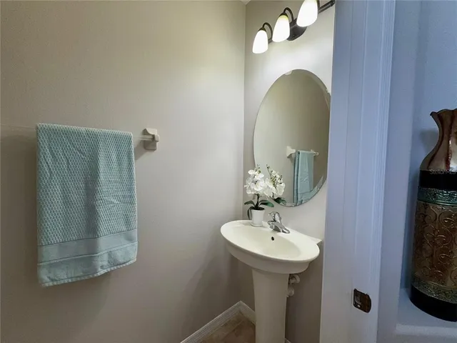 a view of staircase with wooden floor