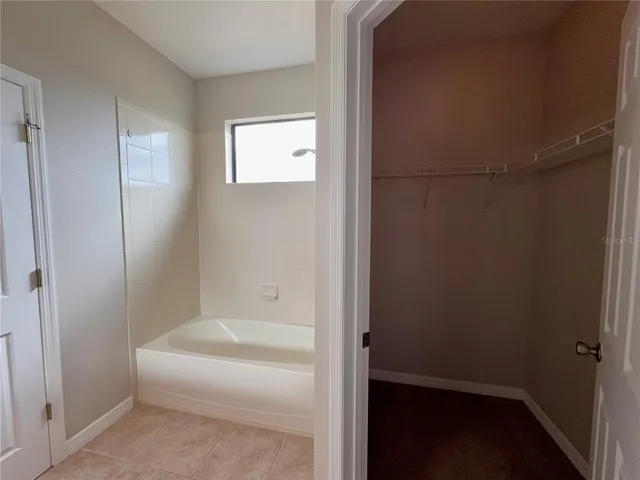 a bathroom with 2 sink and a mirror