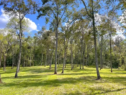 a view of a swimming pool with an outdoor space and seating area