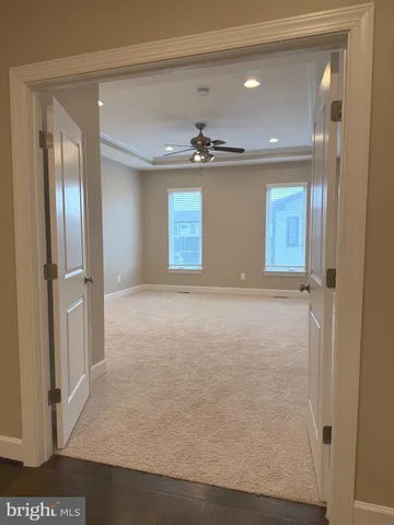 a bathroom with a shower and toilet