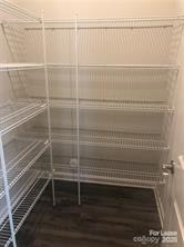 1138 Doveridge Street Charlotte, NC 28273 - Photo 12 of 22 a view of a room with racks on the wall