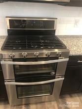 1138 Doveridge Street Charlotte, NC 28273 - Photo 3 of 22 a stove top oven sitting inside of a kitchen