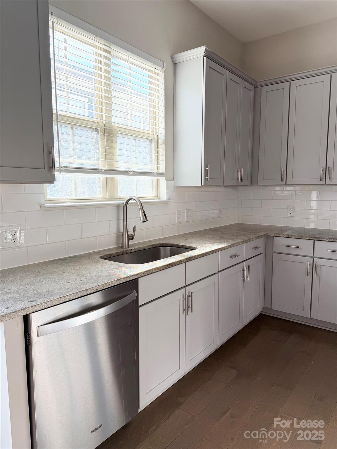 1138 Doveridge Street Charlotte, NC 28273 - Photo 6 of 22 a kitchen with sink cabinets and window