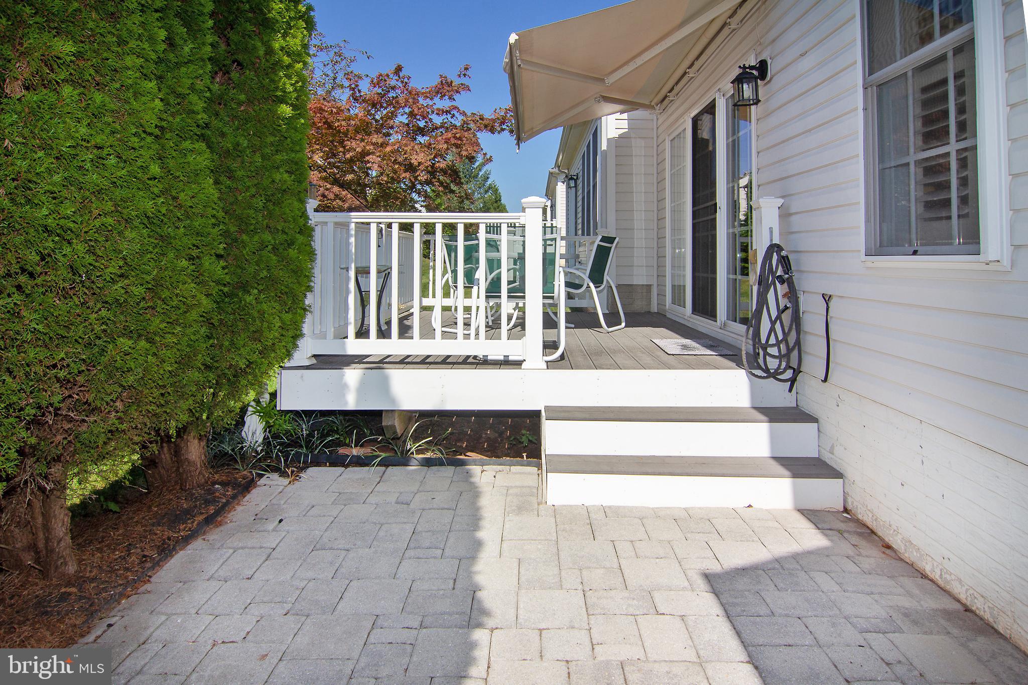127 Ponytail Lane, Unit 133 Taneytown, MD 21787 - Photo 21 of 24 a view of small house with yard and sitting area