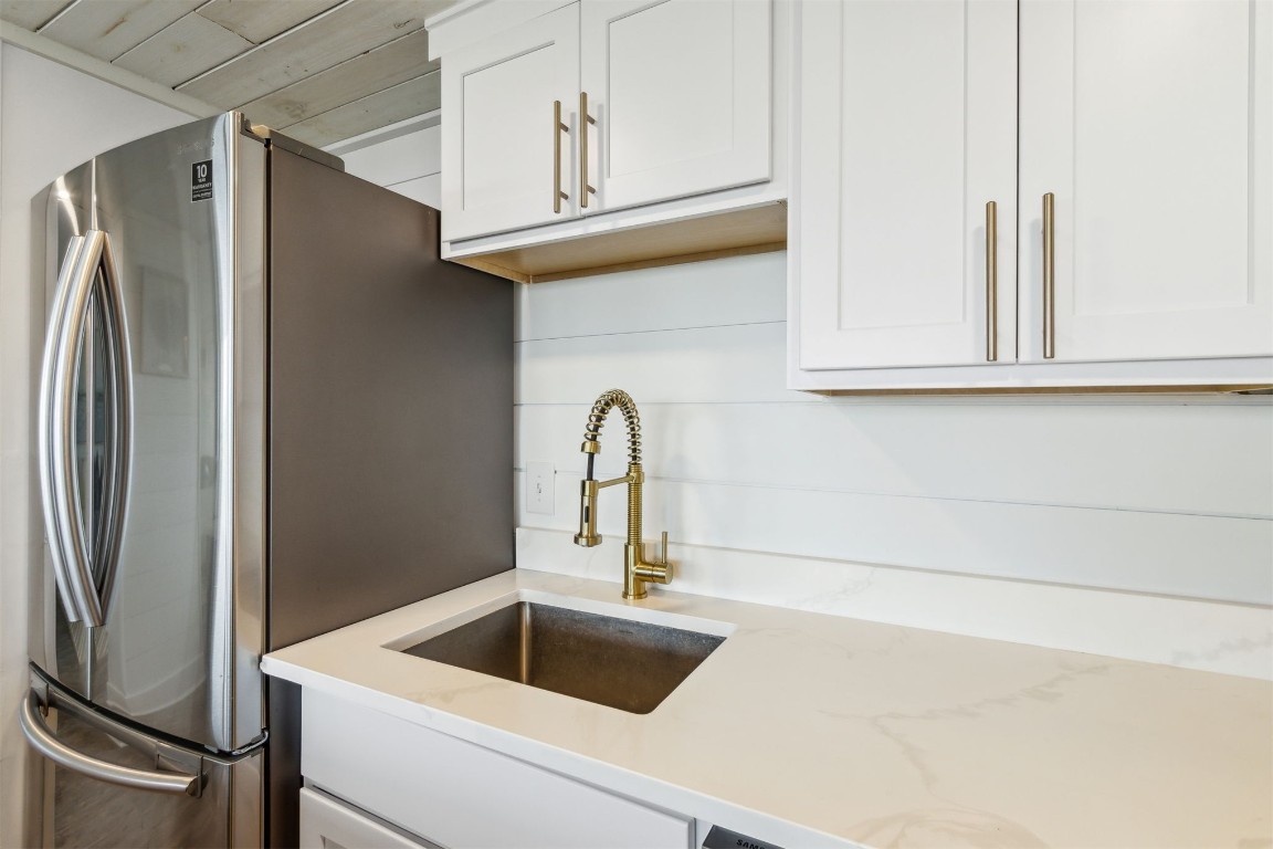 1148 Beach Walker Road, Unit 1148 Fernandina Beach, FL 32034 - Photo 13 of 80 ... premium white cabinetry with brushed gold hard