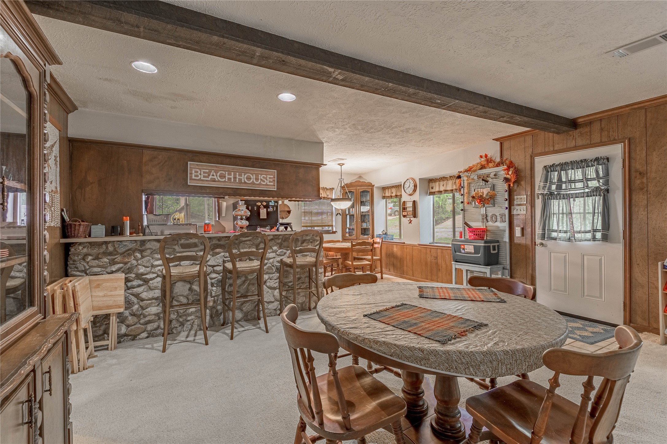109 Hill Top Road Huntsville, TX 77320 - Photo 12 of 38 a view of a dining room with furniture